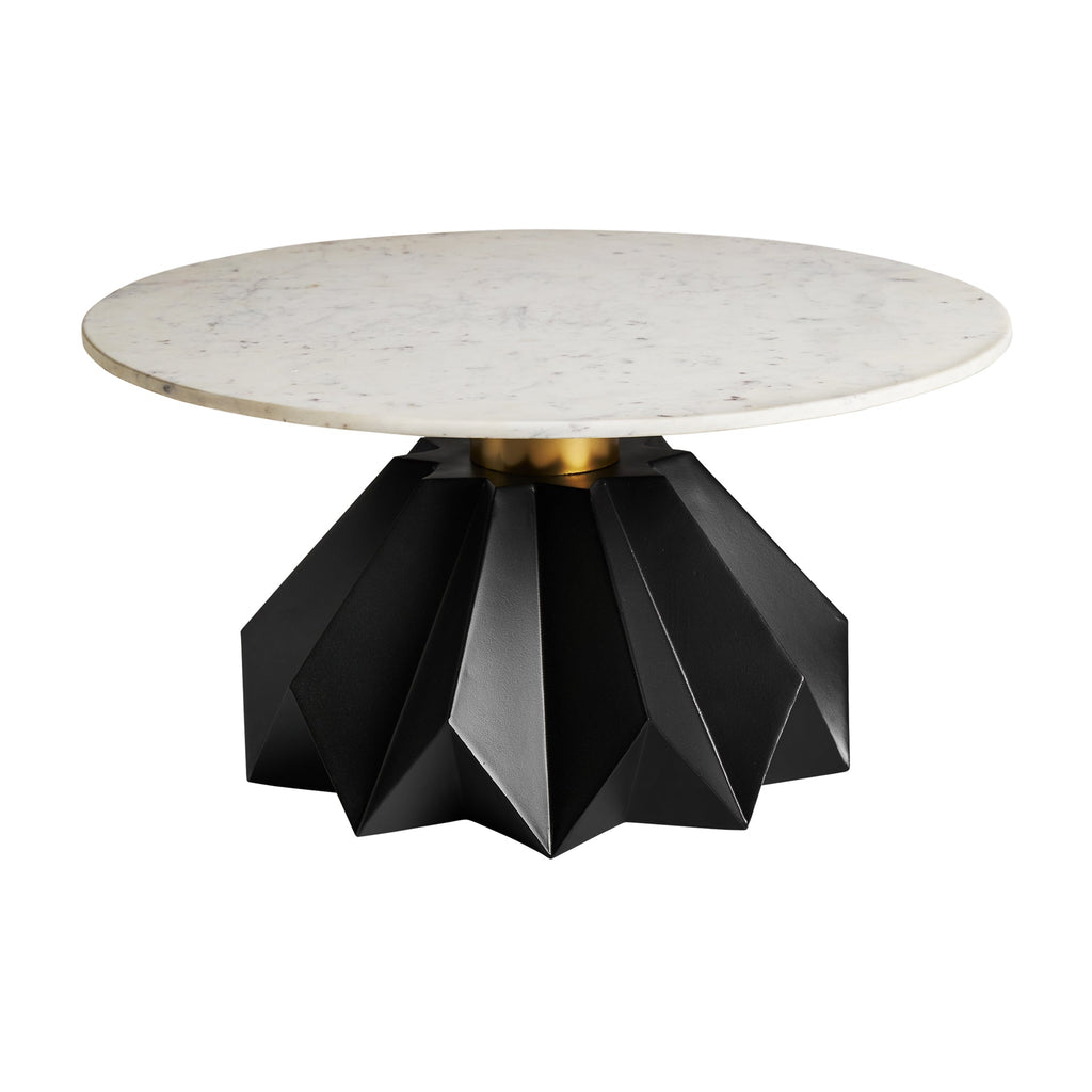 Runder Couchtisch mit einer weissen Marmorplatte auf schwarzem Tischbein - Maison Oudh