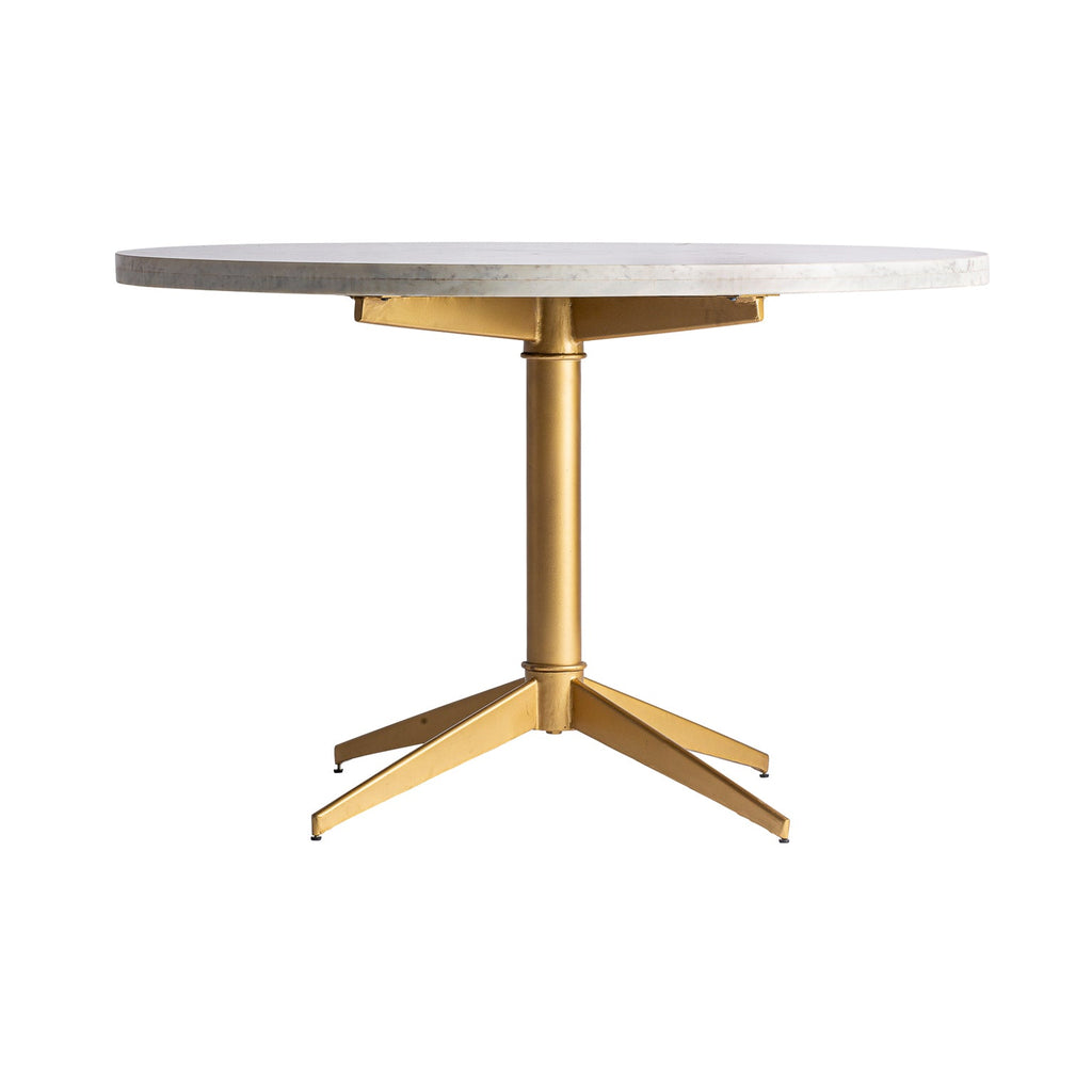 Runder Esstisch in Gold kombiniert mit einer weissen Marmorplatte - Maison Oudh