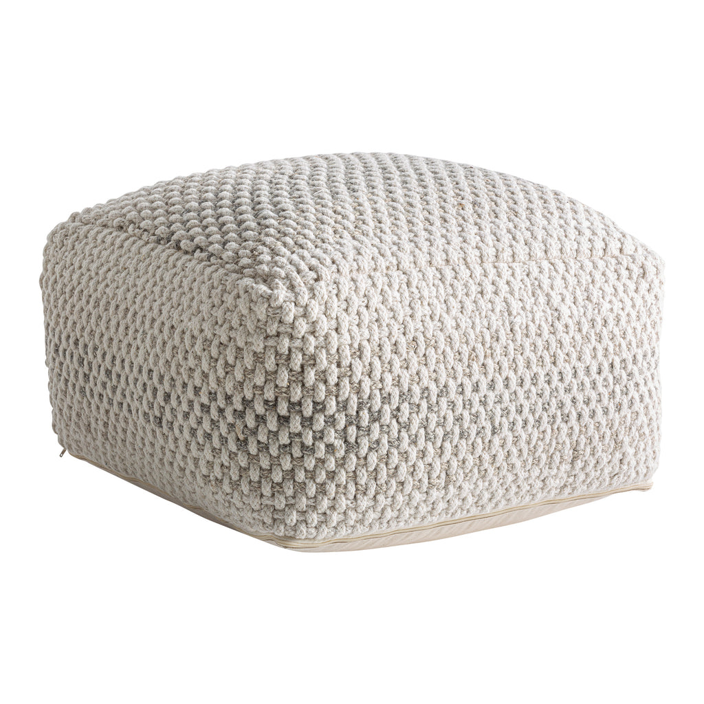 Boho Pouf Hocker aus Wolle in Off White mit grauem Schaumstoffkern im modernen Boho-Stil.