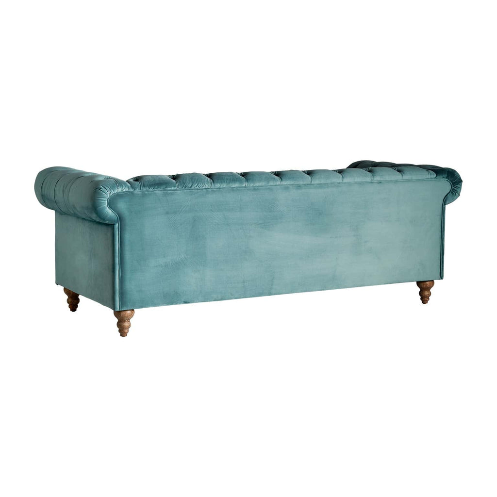Getuftetes Sofa in Türkis aus Samt kombiniert mit Eschenholz und Nieten - Maison Oudh