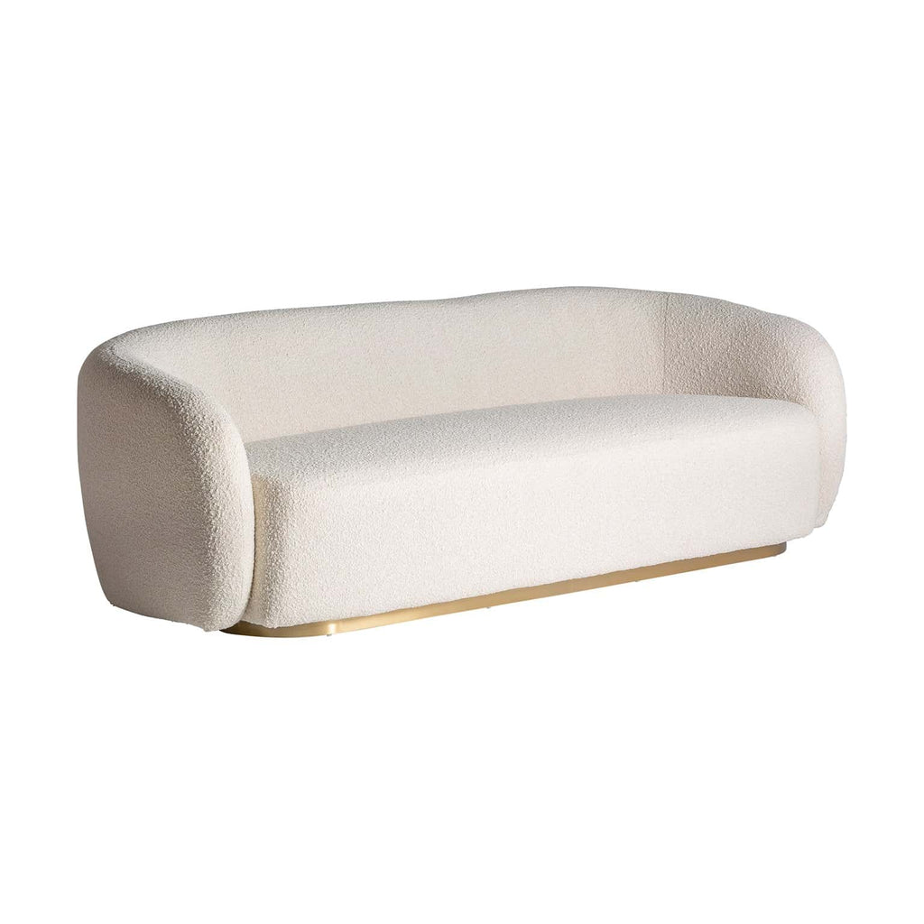 Sofa aus weissem Bouclé kombiniert mit goldenem Stahl - Maison Oudh