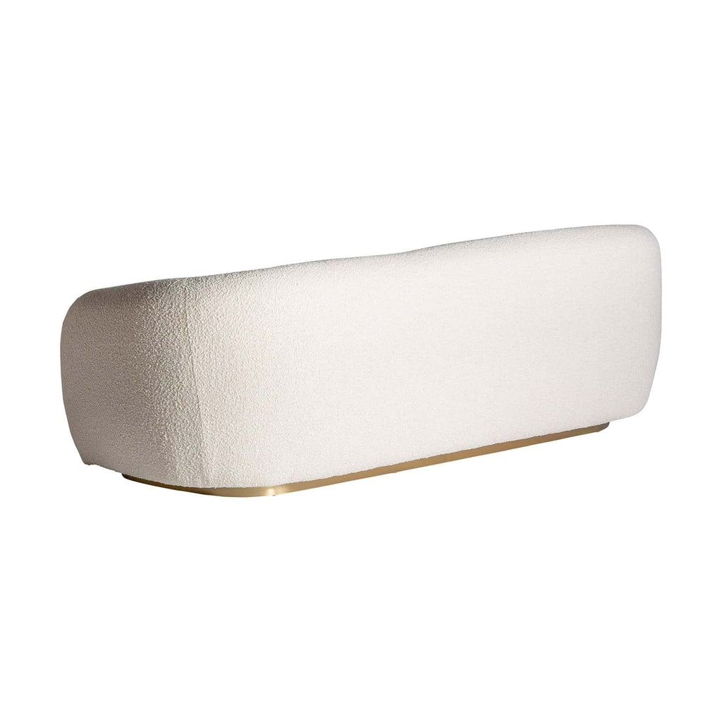 Sofa aus weissem Bouclé kombiniert mit goldenem Stahl - Maison Oudh